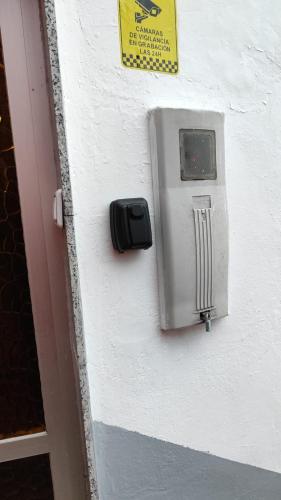 a metal box on the side of a building at Asturias Montaña y Playa in La Vega