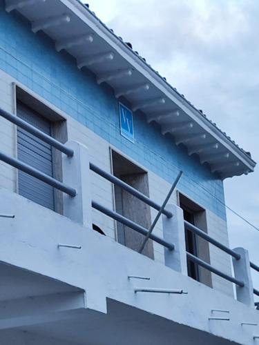a side view of a building with windows at Asturias Montaña y Playa in La Vega
