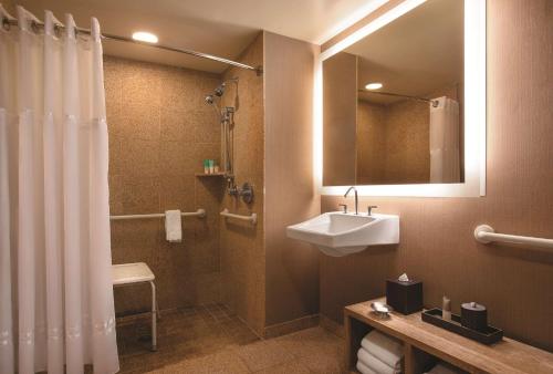 a bathroom with a sink and a shower at Hyatt Regency Lake Tahoe Resort, Spa & Casino in Incline Village