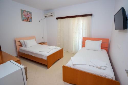 Postel nebo postele na pokoji v ubytování Celo Apartments