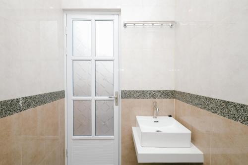 Ванная комната в B Syariah Guest House
