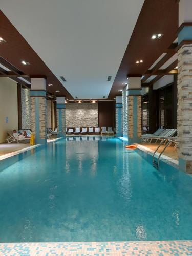 Bazén v ubytování Terra complex -D6 - Balkan private apartment-Spa Sking Golf and Relax nebo v jeho okolí