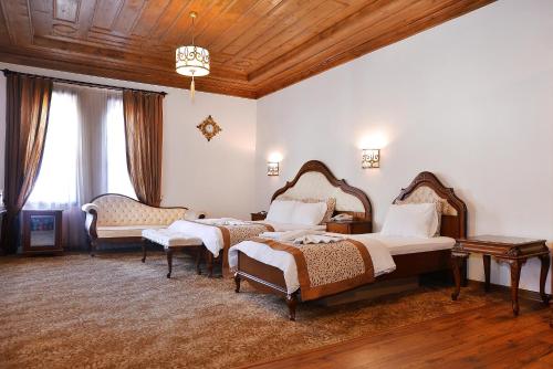 Katil atau katil-katil dalam bilik di Uluhan Hotel