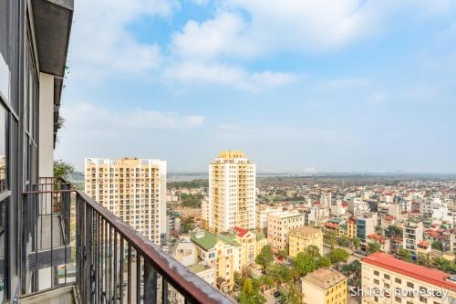 a view of a city from the balcony of a building at Pentstudio 1a in Hanoi