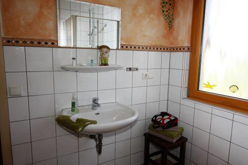 Ένα μπάνιο στο Ferienwohnung Julia Metzger