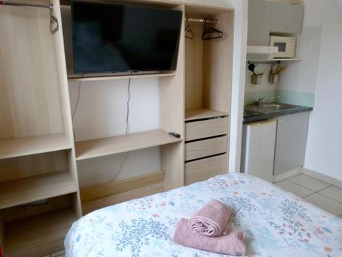 Cama o camas de una habitación en Le Clos d'Aix studio 208 parking