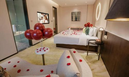 Wuhan Hazens Hotelにあるベッド