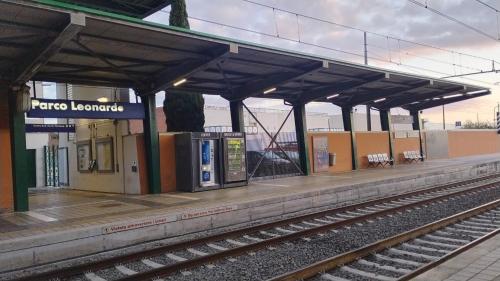 a train station with a platform with a train station at Maison Laurier in Fiumicino Airport