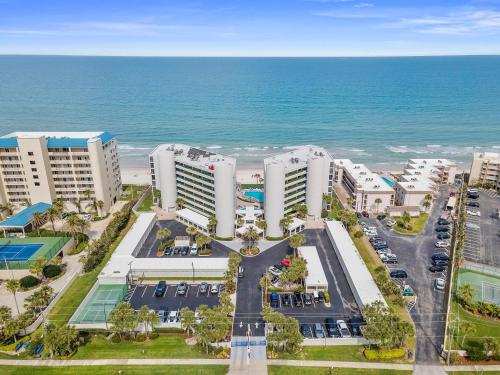 an aerial view of a resort near the ocean at Ebb Tide 703 in New Smyrna Beach