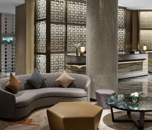 Χώρος καθιστικού στο Doubletree By Hilton Yantai Golden Coast Hotel & Suites