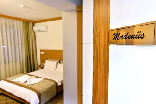 Katil atau katil-katil dalam bilik di Uluhan Hotel