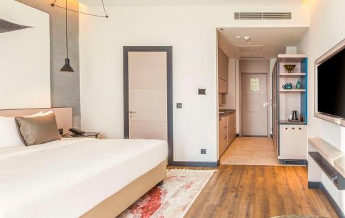 Hilton Garden Inn Samarkand Afrosiyob — Photo of the whole room