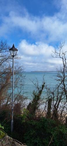 a street light on the side of the beach at Sunset retreat caravan with large wrap around decking in Newquay