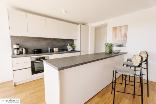 Kuchyň nebo kuchyňský kout v ubytování 124 QM - Exklusiv & Top angebunden - Werse Loft by youpartments
