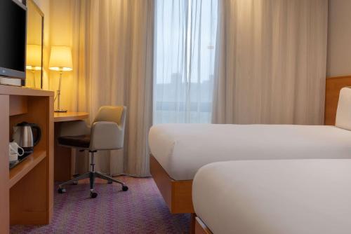 Ένα ή περισσότερα κρεβάτια σε δωμάτιο στο Hampton by Hilton London Waterloo