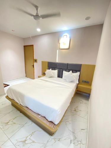 Postel nebo postele na pokoji v ubytování Hotel Elite