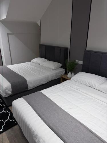 Cama o camas de una habitación en Winn's Hotel Bentong