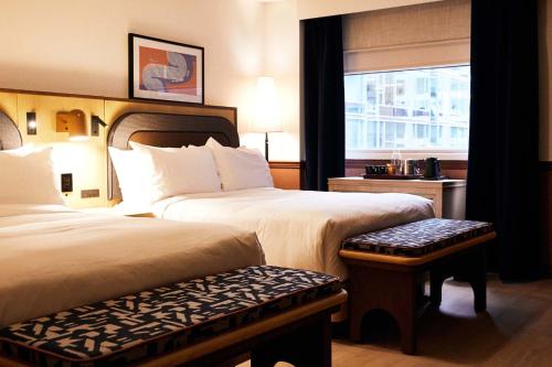 Katil atau katil-katil dalam bilik di Union Hotel