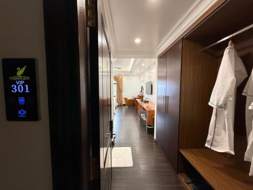 a corridor of a room with a bathroom and a hallway at Nam Khánh HOTEL in Vĩnh Tuy