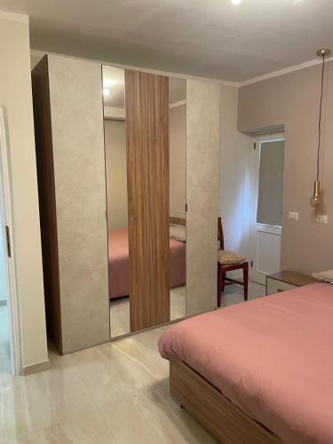 Ένα ή περισσότερα κρεβάτια σε δωμάτιο στο la cASa