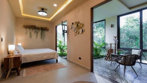 Katil atau katil-katil dalam bilik di Ama private villa 4bdr in LUX Tulum country club