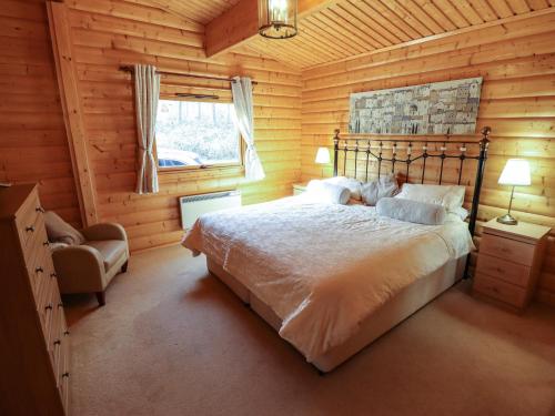 Ένα ή περισσότερα κρεβάτια σε δωμάτιο στο Forest Lodge Kenwick Park