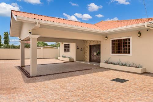 a rendering of a house with a garage at CORONADO, LAS BRISAS in Playa Coronado