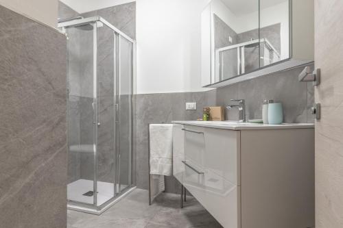 a bathroom with a shower and a sink at Santa Maria Gualtieri in Pavia