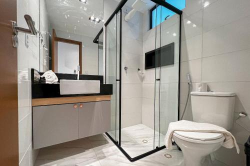 Et badeværelse på Intermares Moderno Studio 3 pessoas 300m Praia