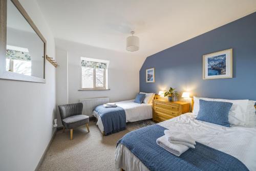 Voodi või voodid majutusasutuse Grove Lodge toas