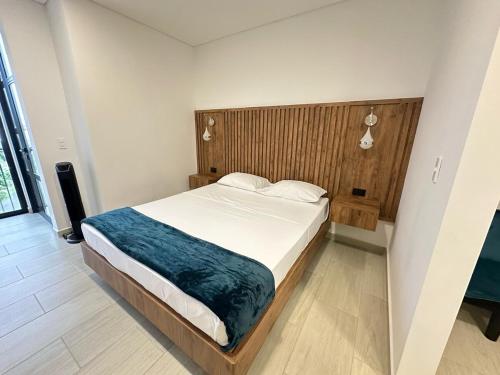 Postel nebo postele na pokoji v ubytování Amara404 Lindo apartaestudio tipo estudio en barrio Laureles con balcon