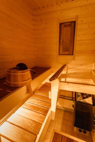 a inside of a sauna with a hat in it at Motelli Rovaniemi in Rovaniemi