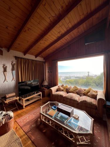 Ein Sitzbereich in der Unterkunft Casa de playa con vista al mar