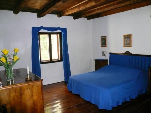 Postel nebo postele na pokoji v ubytování Agriturismo Beria de Carvalho de Puppi