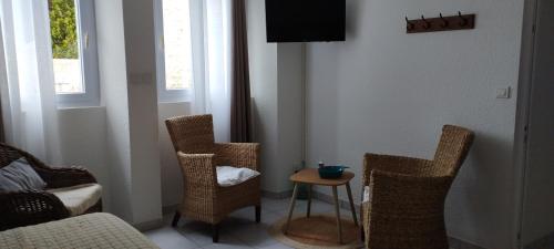 Χώρος καθιστικού στο Chambres d 'Hotes Le Logis de la Palle