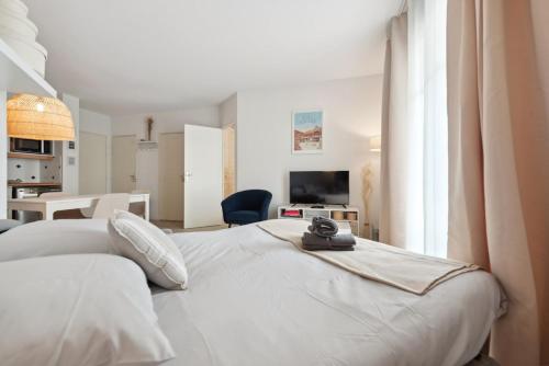 Postel nebo postele na pokoji v ubytování Le Coeur du Port Guillaume 4 pers