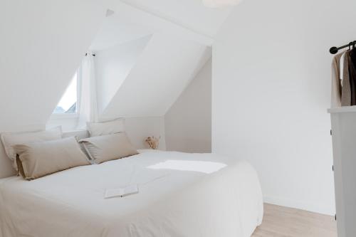 Katil atau katil-katil dalam bilik di Proche Honfleur Chaleureux Duplex Centre Ville 2