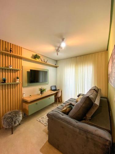 TV a/nebo společenská místnost v ubytování APARTAMENTO Completo 100 Metros PRAIA 19 Minutos BETO CARREIRO