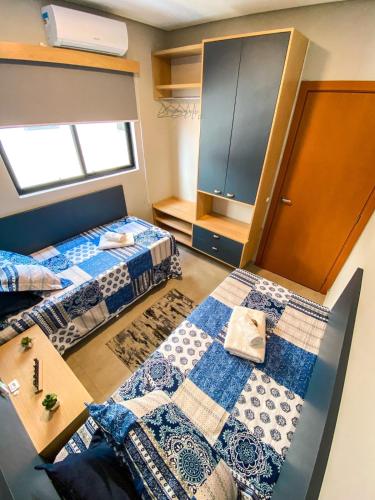 Postel nebo postele na pokoji v ubytování APARTAMENTO Completo 100 Metros PRAIA 19 Minutos BETO CARREIRO