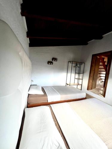 Ένα ή περισσότερα κρεβάτια σε δωμάτιο στο Villa Archontissa