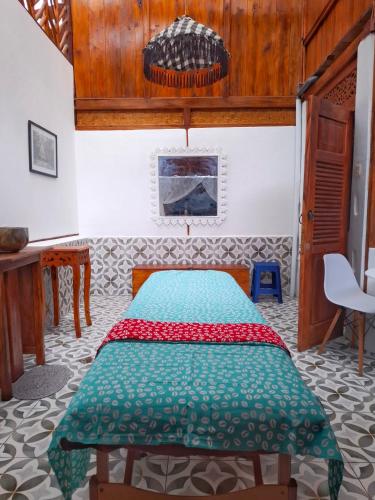Ένα ή περισσότερα κρεβάτια σε δωμάτιο στο Manoa, boutique Villas and Spa