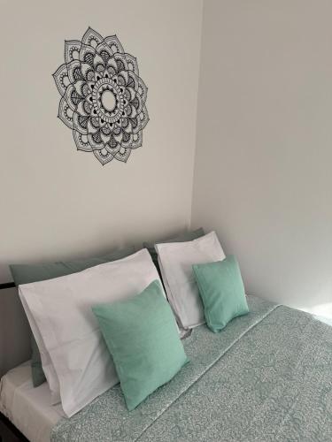 Letto o letti in una camera di Sofia's Bella Vista Pagoi