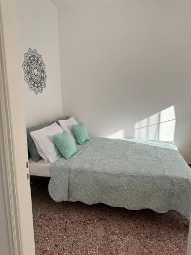 Letto o letti in una camera di Sofia's Bella Vista Pagoi