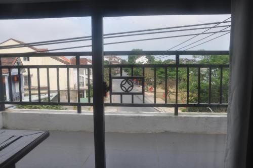 Balkoni atau teres di Autumn Bay Riverside Villa
