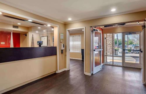 an office with a lobby with a counter and a door at Extended Stay America Suites - Los Angeles - Monrovia in Monrovia