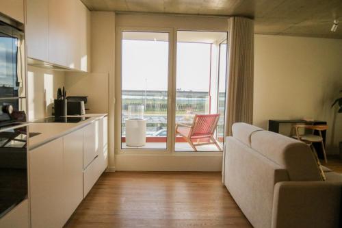 Cuisine ou kitchenette dans l'établissement Story Studio Aveiro Ria - Lagoon