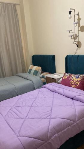 Un ou plusieurs lits dans un hébergement de l'établissement Studio near airport