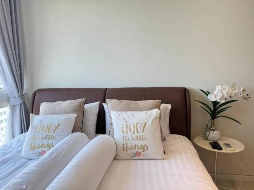 Ένα ή περισσότερα κρεβάτια σε δωμάτιο στο Luxury Seaview Condo