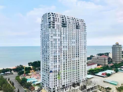 a rendering of a tall white apartment building at Căn Hộ "2" OaSky View biển 3 Phòng 5 Giường- Oasky Sea View Apartment in Vung Tau