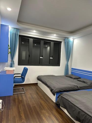 Кровать или кровати в номере Rose house